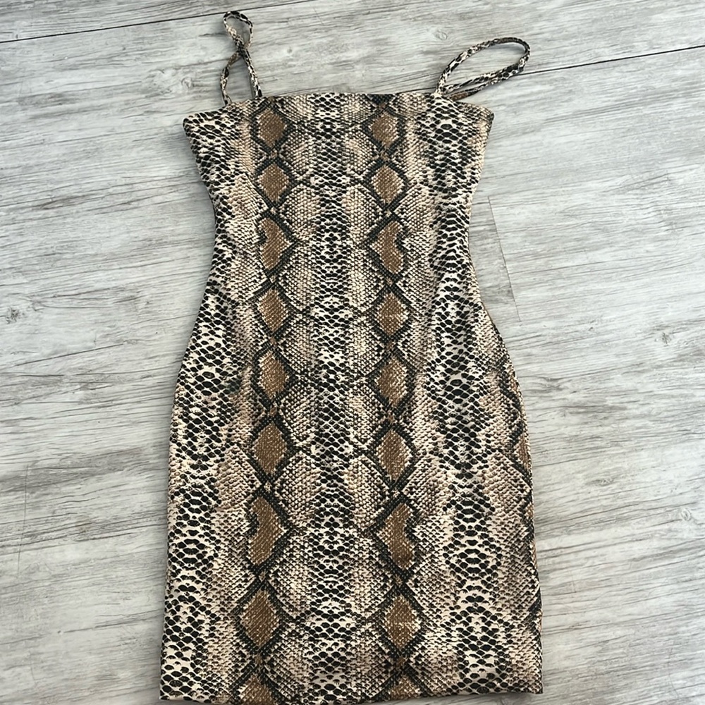 Pattering snakeskin dress